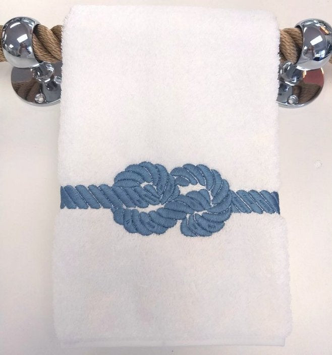 Nautical bathroom outlet hand towels